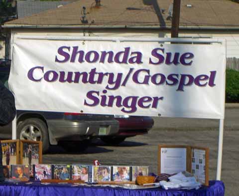 Mini 41 - Shonda Sue sells her wares.jpg